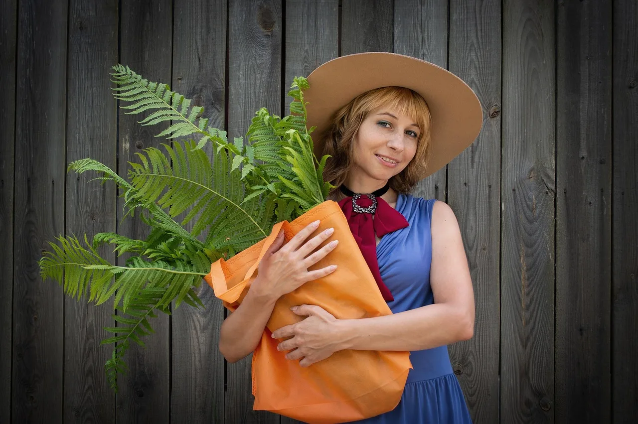 woman, a bag, plants, nature, hat, florist, smile, fern, hedge, summer, human, young, portrait, russian, slav. How to Price Florist Services for Everyday Bouquets